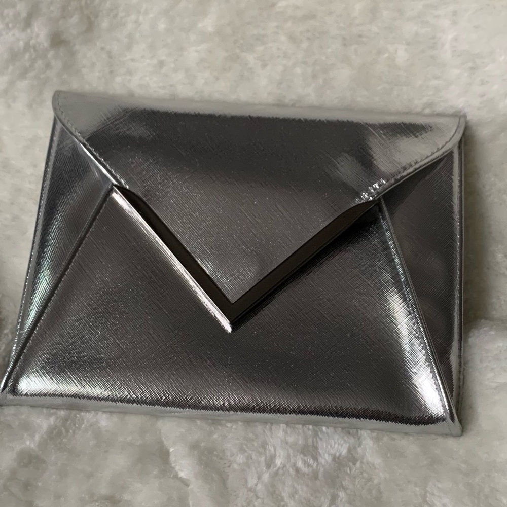 NWT La Prairie hand clutch bag.